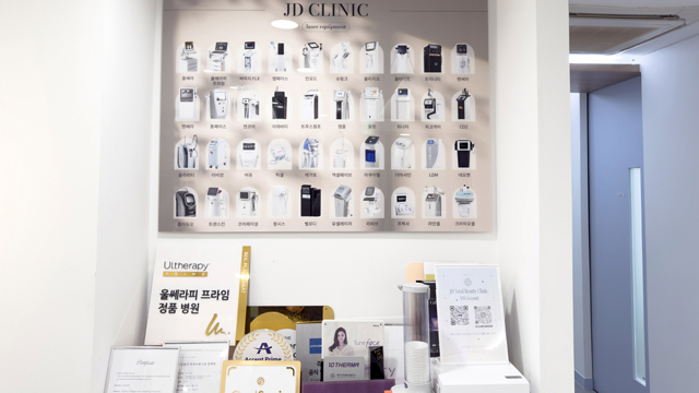 Medical device display and certificates at JD Clinic.