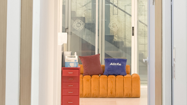 Waiting area at JD Clinic with orange seating.