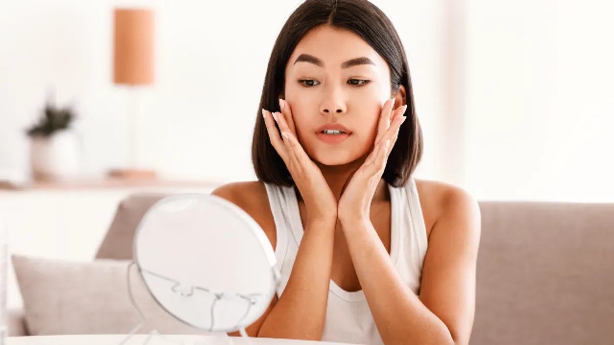Patient Looking At Mirror