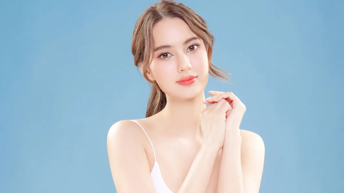 Woman with smooth, firm skin showcasing Thermage FLX radiofrequency skin tightening treatment results