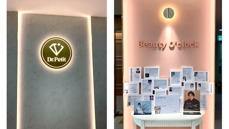 Interior display at Doctorpetit Hongdae with clinic logo, photos, and autographs.