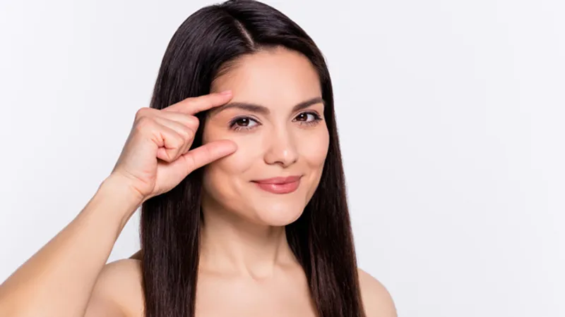 Woman showing her eyes after Eye XERF Airderm Eyebrow Lifting treatment.