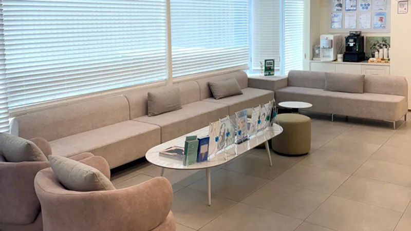 IBON Plastic Surgery patient waiting lounge and clinic interior for middle-age eye surgery consultation