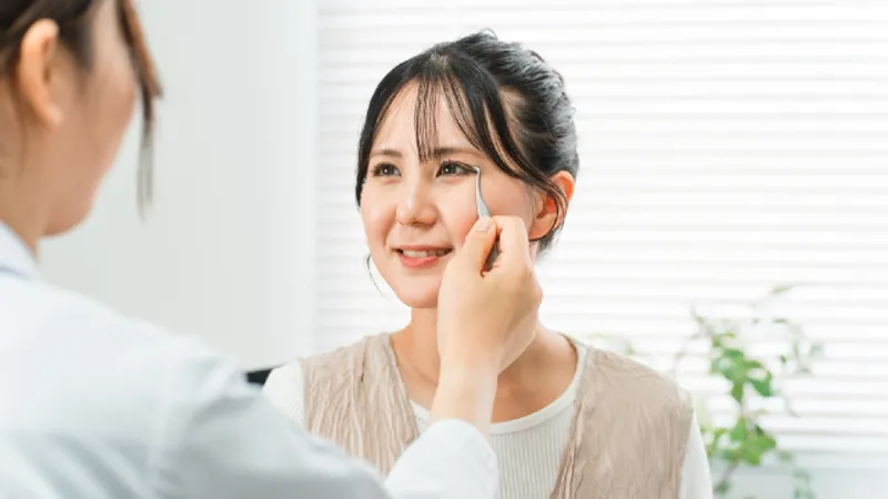 Clinician examining a patient