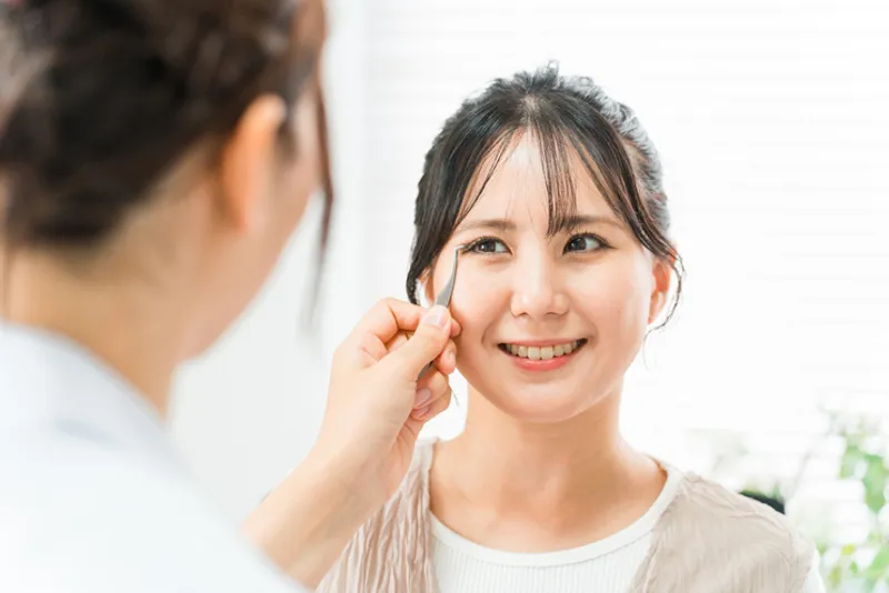 Patient receiving double eyelid surgery consultation